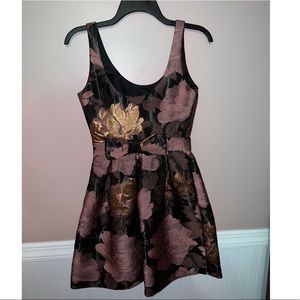 S - floral skater dress, iridescent threading, bow on backside